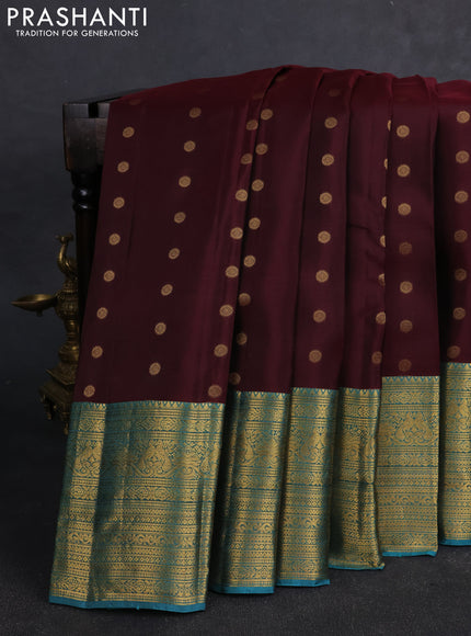 Kanchipuram silk saree wine shade and teal green with allover zari woven buttas and long rich zari woven border