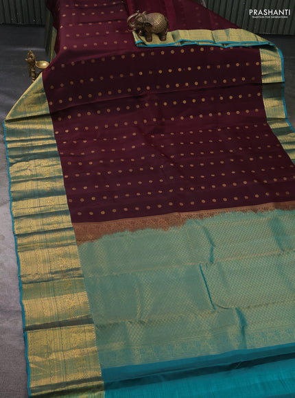 Kanchipuram silk saree wine shade and teal green with allover zari woven buttas and long rich zari woven border