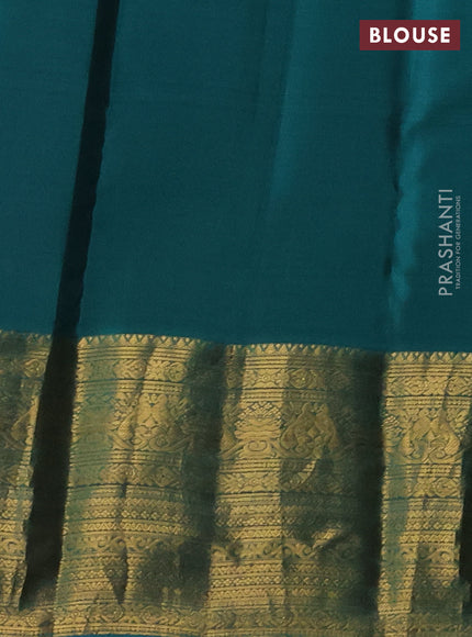 Kanchipuram silk saree wine shade and teal green with allover zari woven buttas and long rich zari woven border