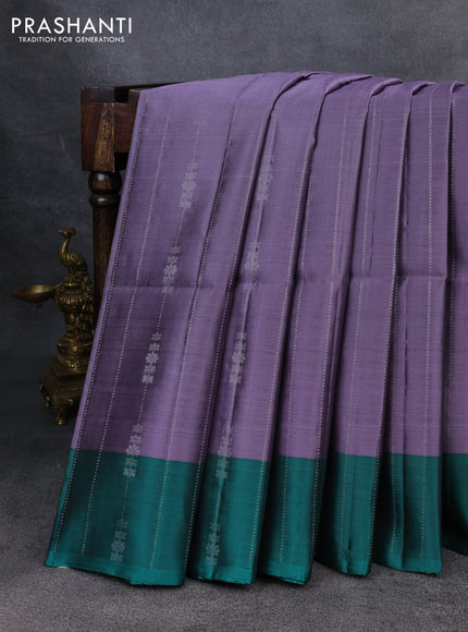 Kanchipuram silk saree lavender and teal green with allover silver zari weaves and simple zari border