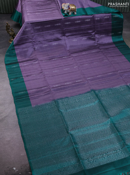 Kanchipuram silk saree lavender and teal green with allover silver zari weaves and simple zari border