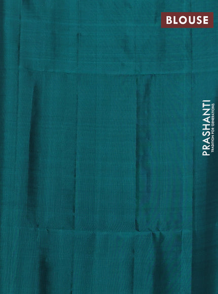 Kanchipuram silk saree lavender and teal green with allover silver zari weaves and simple zari border