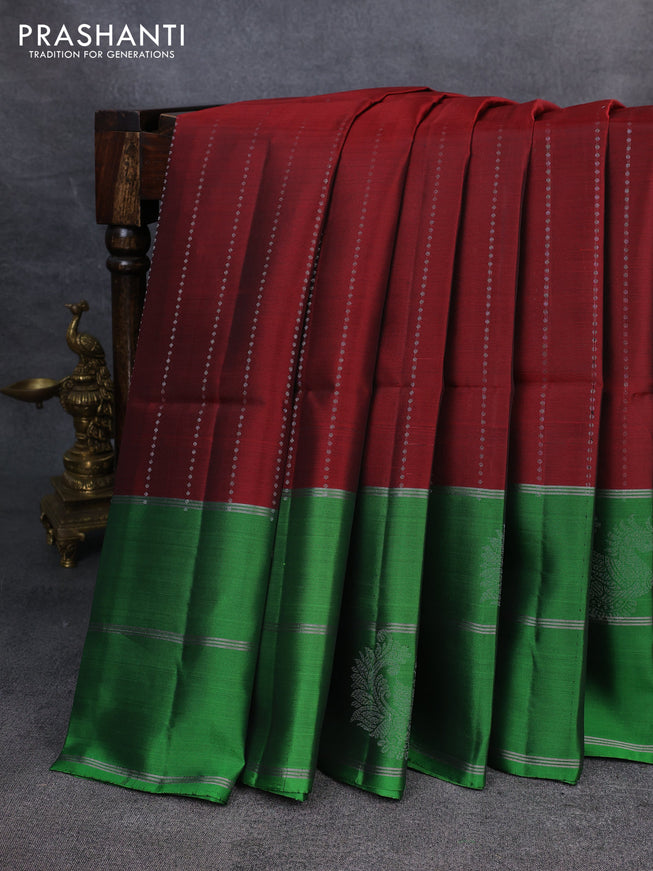 Kanchipuram soft silk saree maroon and green with allover silver zari weaves and long zari woven annam butta border