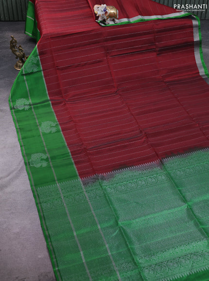 Kanchipuram soft silk saree maroon and green with allover silver zari weaves and long zari woven annam butta border
