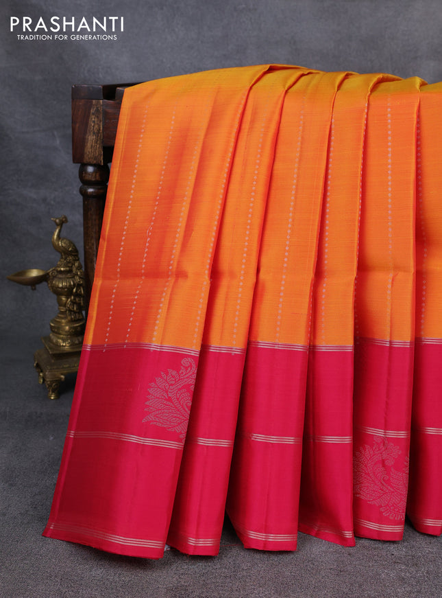 Kanchipuram soft silk saree mango yellow and pink with allover silver zari weaves and long zari woven annam butta border