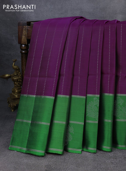 Kanchipuram soft silk saree purple and green with allover silver zari weaves and long zari woven annam butta border
