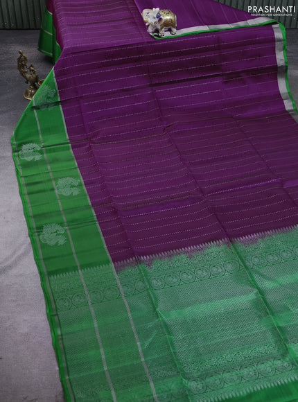 Kanchipuram soft silk saree purple and green with allover silver zari weaves and long zari woven annam butta border
