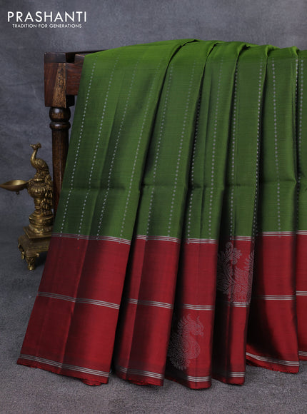 Kanchipuram soft silk saree green and maroon with allover silver zari weaves and long zari woven annam butta border