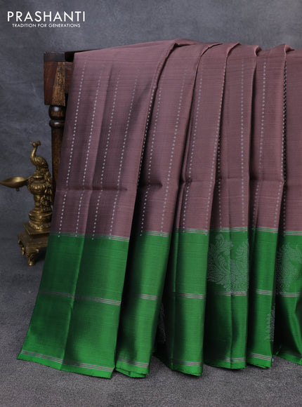Kanchipuram soft silk saree pastel brown and green with allover silver zari weaves and long zari woven annam butta border