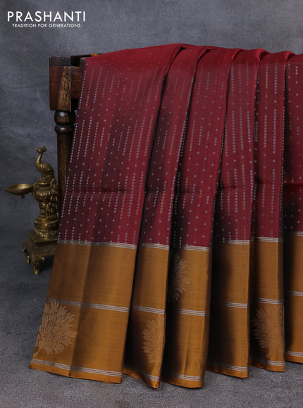 Kanchipuram soft silk saree maroon and dark mustard with allover silver & gold zari weaves and long zari woven border