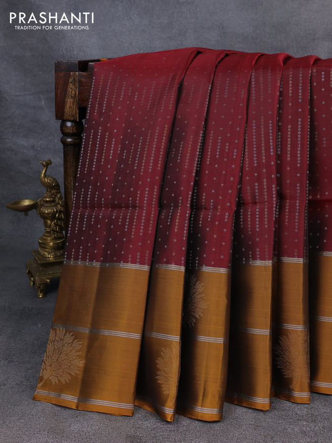 Kanchipuram soft silk saree maroon and dark mustard with allover silver & gold zari weaves and long zari woven border
