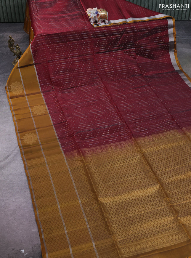 Kanchipuram soft silk saree maroon and dark mustard with allover silver & gold zari weaves and long zari woven border