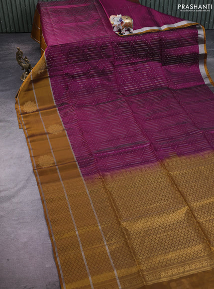 Kanchipuram soft silk saree purple and dark mustard with allover silver & gold zari weaves and long zari woven border