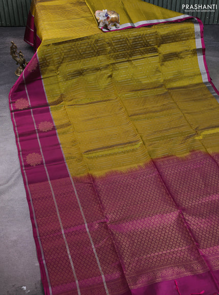 Kanchipuram soft silk saree mehendi green and magenta pink with allover silver & gold zari weaves and long zari woven border