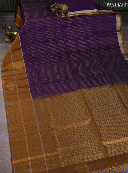 Kanchipuram soft silk saree violet and dark mustard with allover silver & gold zari weaves and long zari woven border