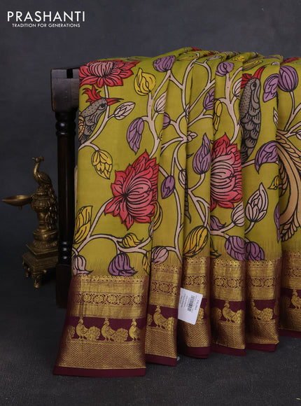 Pure kanchipuram pen kalamkari saree mehendi green and deep wine with allover penkalamkari prints and zari woven border