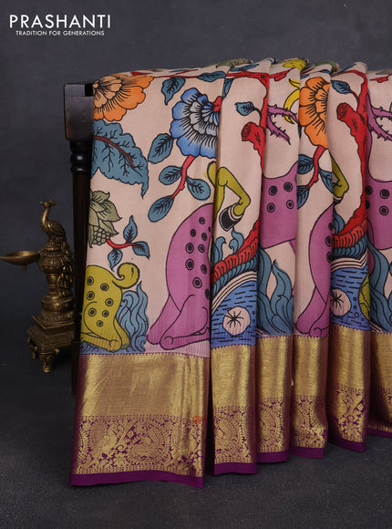 Pure kanchipuram pen kalamkari saree mild peach and purple with allover penkalamkari prints and zari woven border