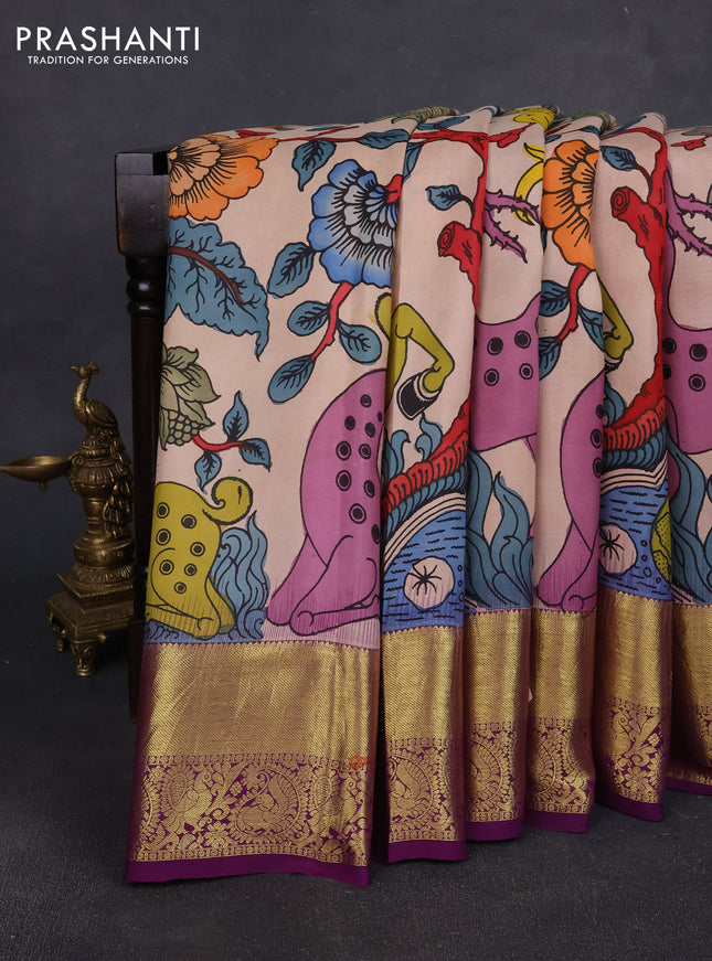 Pure kanchipuram pen kalamkari saree mild peach and purple with allover penkalamkari prints and zari woven border