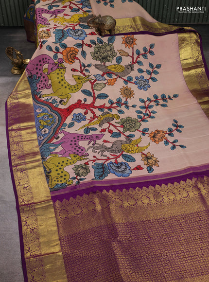 Pure kanchipuram pen kalamkari saree mild peach and purple with allover penkalamkari prints and zari woven border