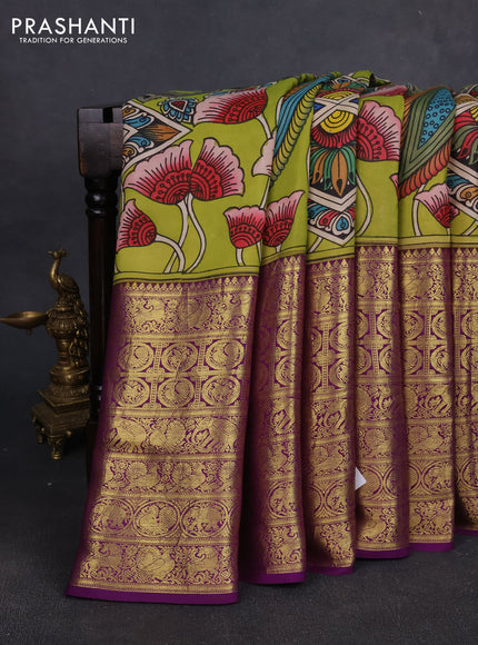 Pure kanchipuram pen kalamkari saree light green and violet with allover penkalamkari prints and zari woven border
