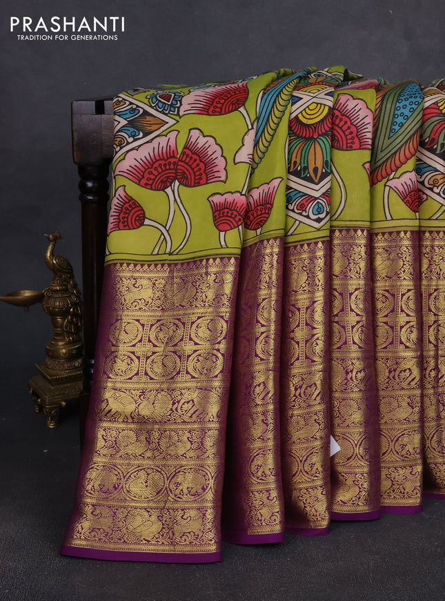 Pure kanchipuram pen kalamkari saree light green and violet with allover penkalamkari prints and zari woven border