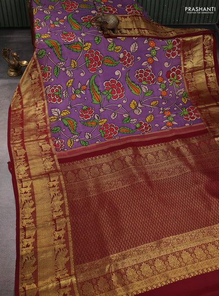 Pure kanchipuram pen kalamkari saree purple and maroon with allover penkalamkari prints and zari woven border