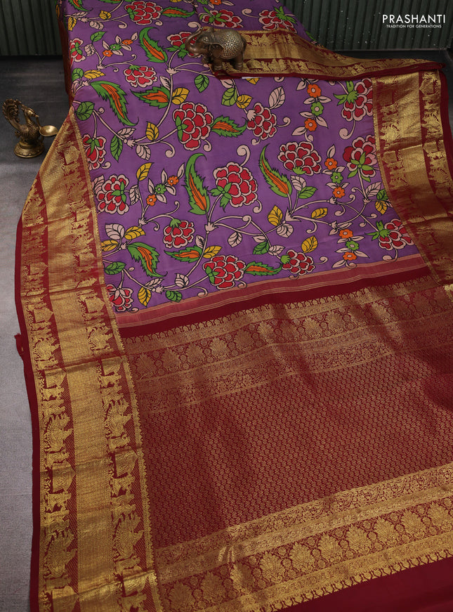 Pure kanchipuram pen kalamkari saree purple and maroon with allover penkalamkari prints and zari woven border