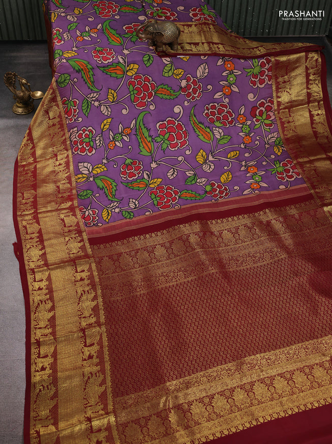 Pure kanchipuram pen kalamkari saree purple and maroon with allover penkalamkari prints and zari woven border