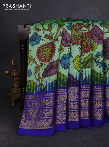 Pure kanchipuram pen kalamkari saree teal green and blue with allover penkalamkari prints and zari woven border