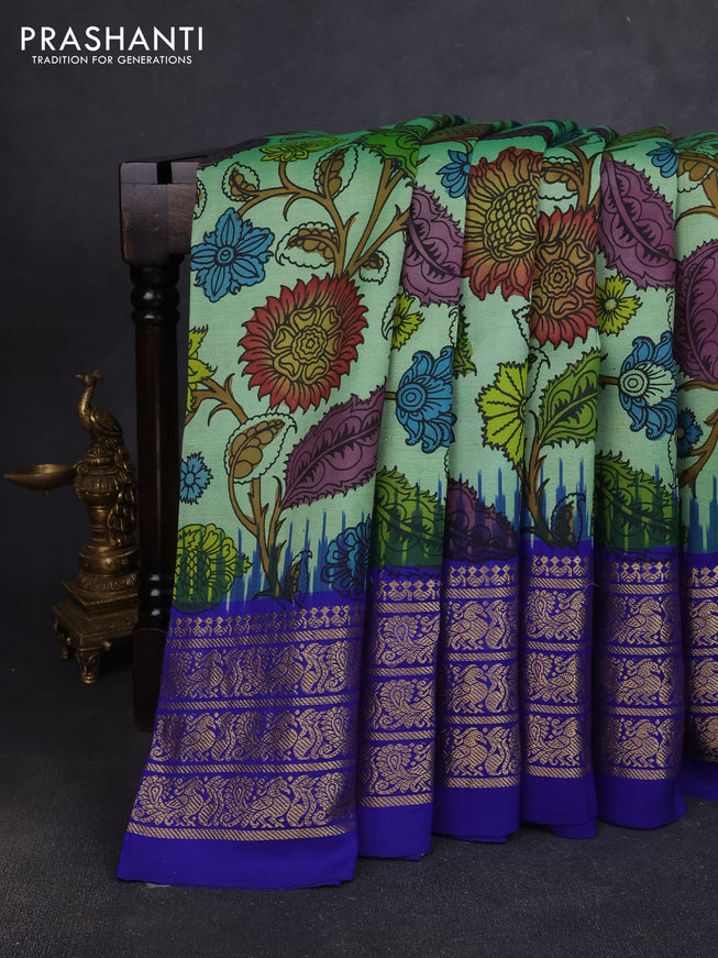 Pure kanchipuram pen kalamkari saree teal green and blue with allover penkalamkari prints and zari woven border