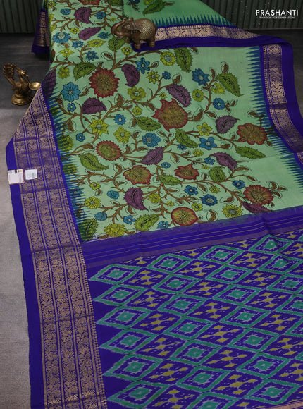 Pure kanchipuram pen kalamkari saree teal green and blue with allover penkalamkari prints and zari woven border