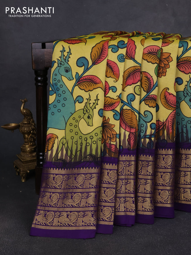 Pure kanchipuram pen kalamkari saree lime yellow and blue with allover penkalamkari prints and zari woven border