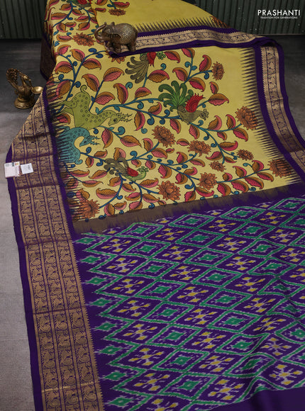 Pure kanchipuram pen kalamkari saree lime yellow and blue with allover penkalamkari prints and zari woven border