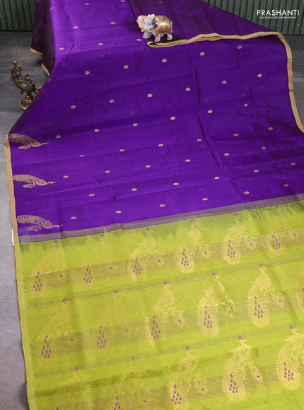 Silk cotton saree purple and light green with zari woven buttas and peacock design zari woven border