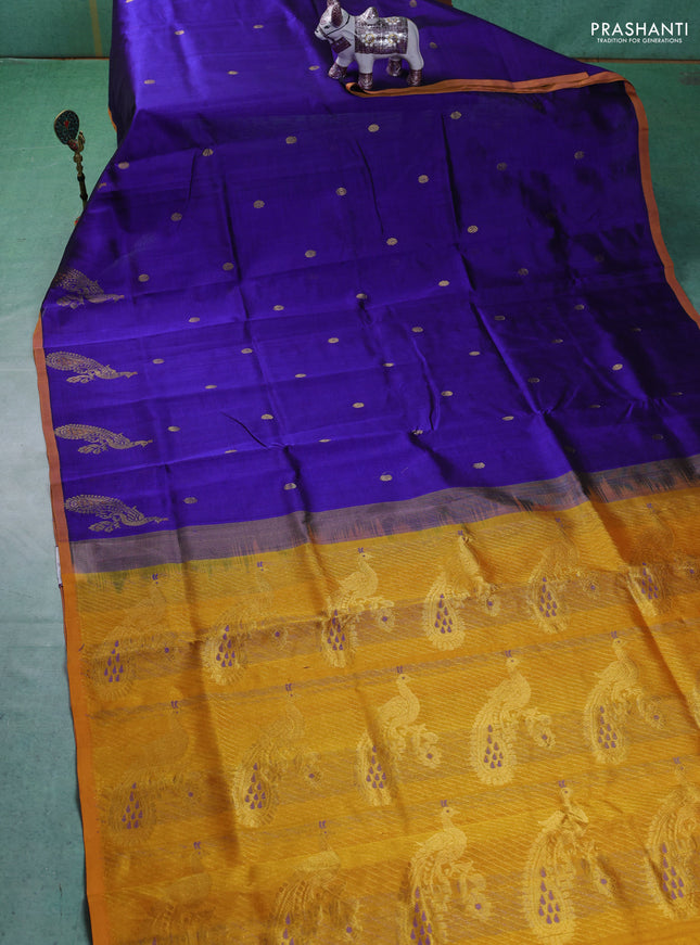 Silk cotton saree blue and mustard yellow with zari woven buttas and peacock design zari woven border