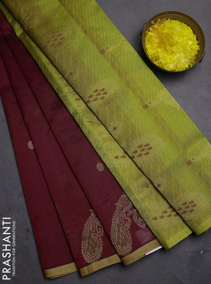 Silk cotton saree maroon and light green with zari woven buttas and peacock design zari woven border