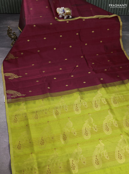 Silk cotton saree maroon and light green with zari woven buttas and peacock design zari woven border