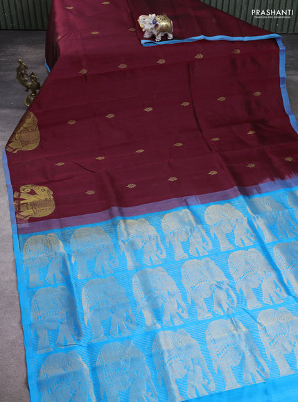 Silk cotton saree maroon and cs blue with zari woven buttas and elephant butta border