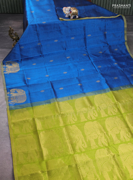 Silk cotton saree cs blue and light green with zari woven buttas and elephant butta border