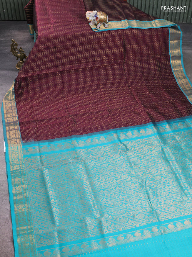Silk cotton saree deep maroon and teal blue with allover zari checks & lakshadeepam weaves and zari woven border