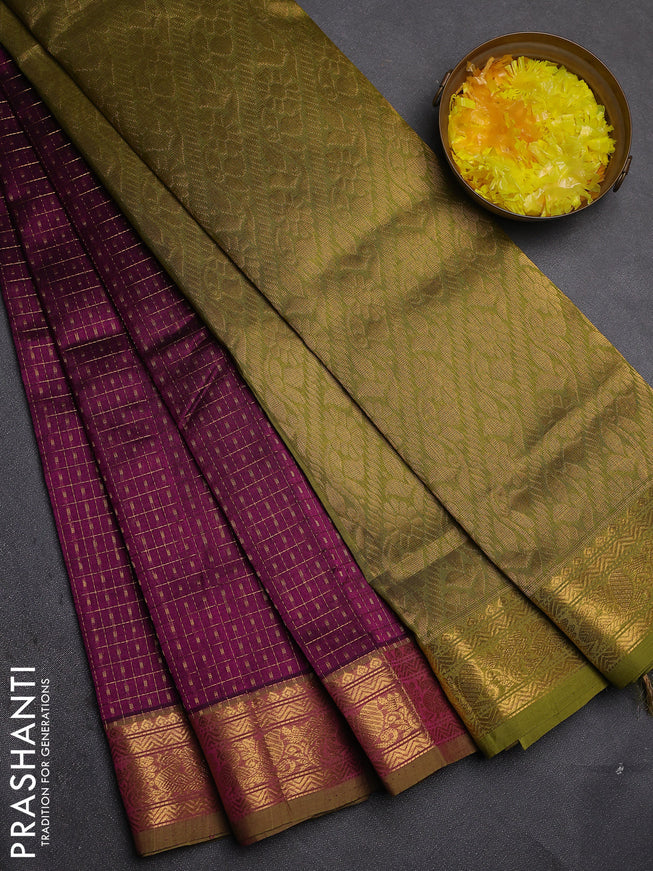 Silk cotton saree purple and mehendi green with allover zari checks & lakshadeepam weaves and zari woven border