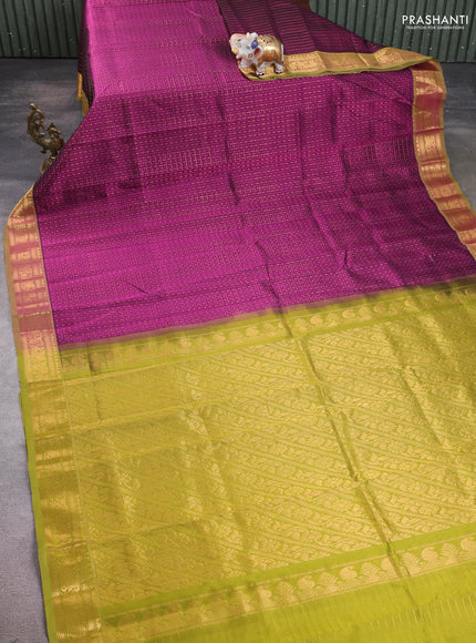 Silk cotton saree purple and mehendi green with allover zari checks & lakshadeepam weaves and zari woven border