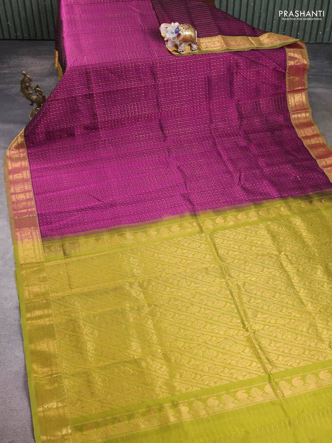 Silk cotton saree purple and mehendi green with allover zari checks & lakshadeepam weaves and zari woven border