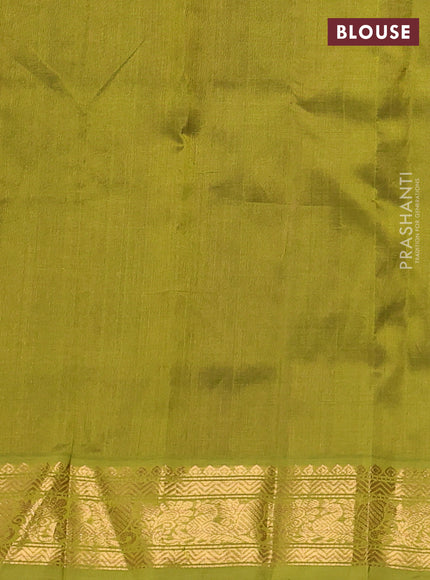 Silk cotton saree purple and mehendi green with allover zari checks & lakshadeepam weaves and zari woven border