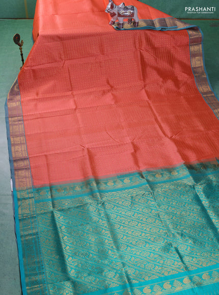 Silk cotton saree orange and teal blue with allover zari checks & lakshadeepam weaves and zari woven border