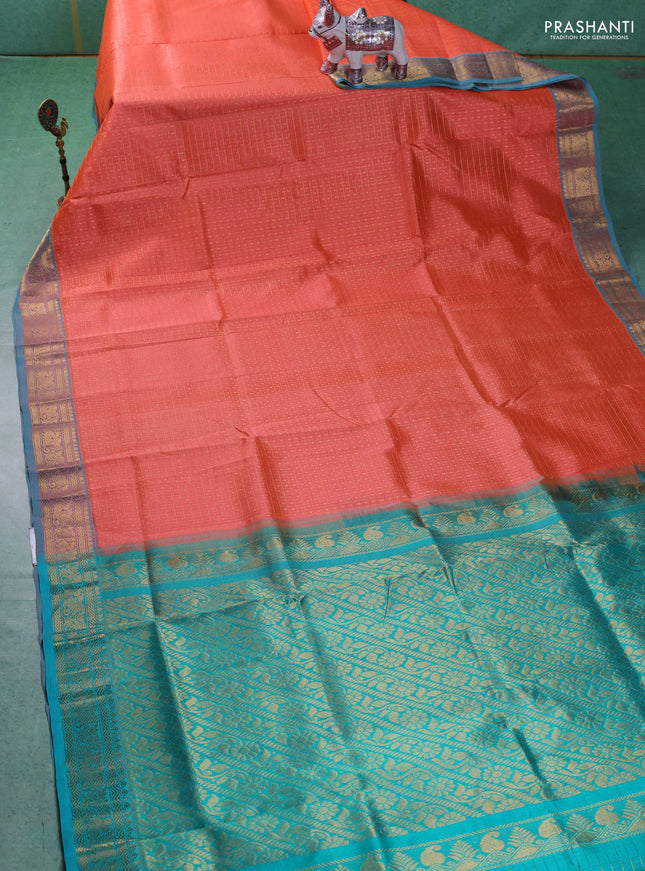 Silk cotton saree orange and teal blue with allover zari checks & lakshadeepam weaves and zari woven border