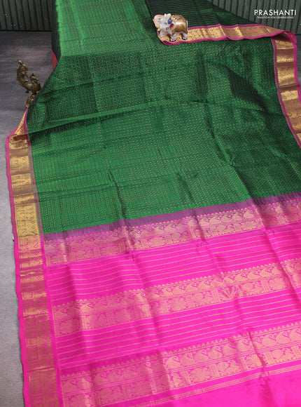 Silk cotton saree green and pink with allover zari checks & lakshadeepam weaves and zari woven border