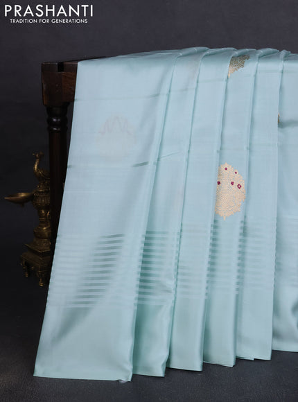 Pure banarasi silk saree pastel shade with zari woven buttas and satin border