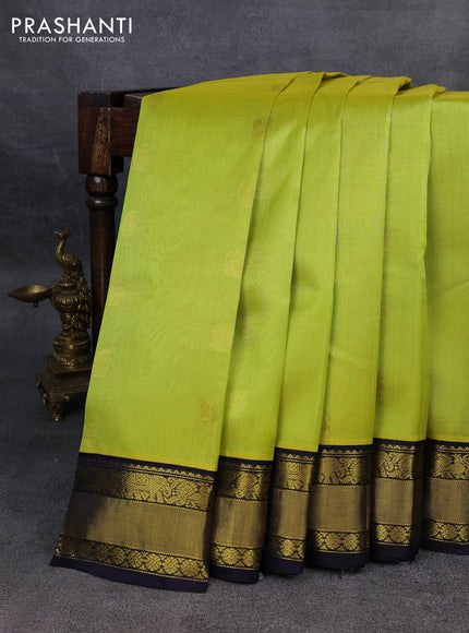 Kuppadam silk cotton saree lime green and navy blue with annam zari woven buttas and zari woven border