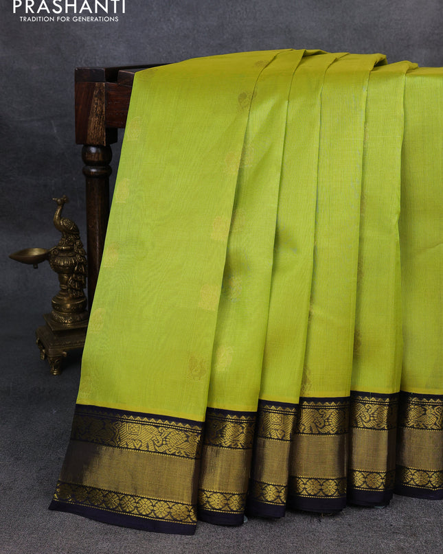 Kuppadam silk cotton saree lime green and navy blue with annam zari woven buttas and zari woven border